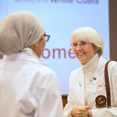Two women at the Women in White Coats event