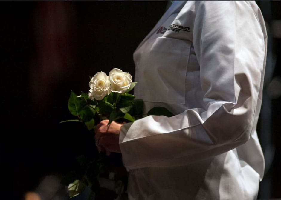 Doctor Holding Roses