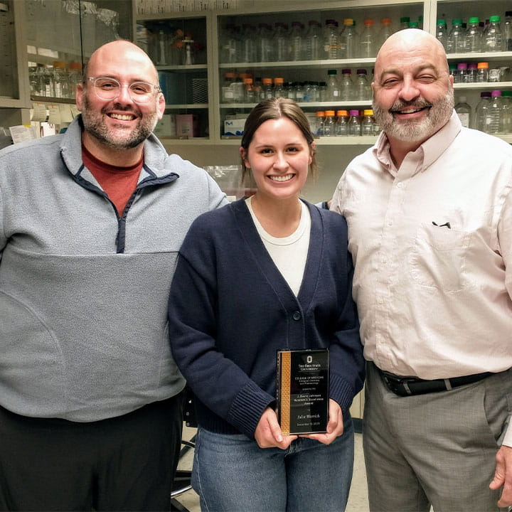 Julia Warrick receiving the 2025  Johnson Academic Excellence Award.