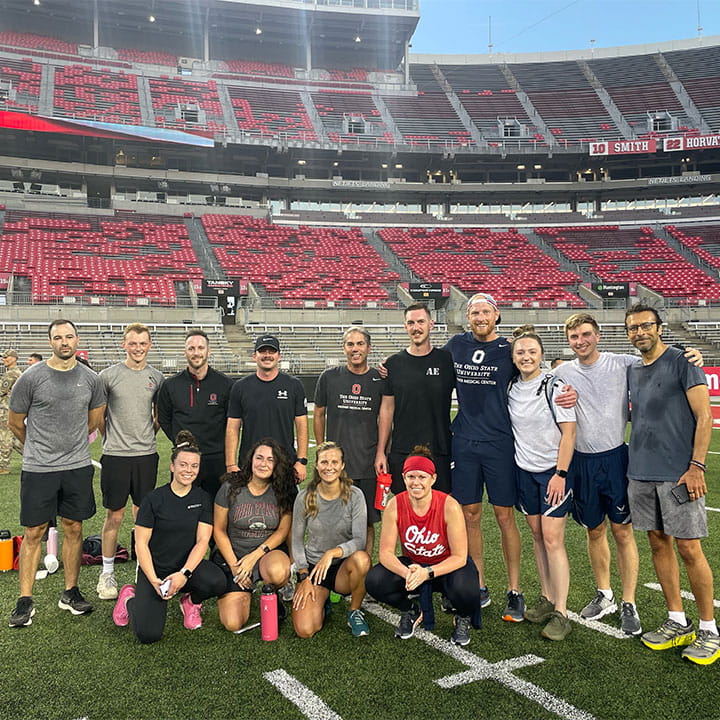 Group photo of residents in the OSU stadium.