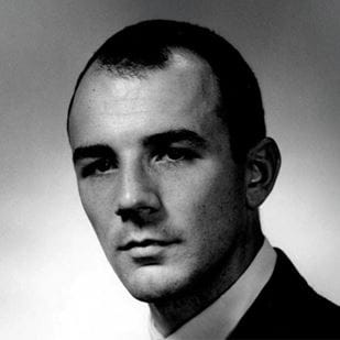 man poses for photo