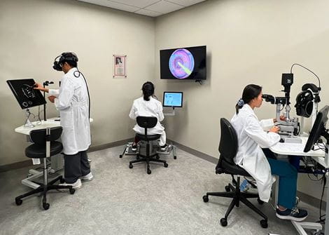 3 residents using the surgical simulators