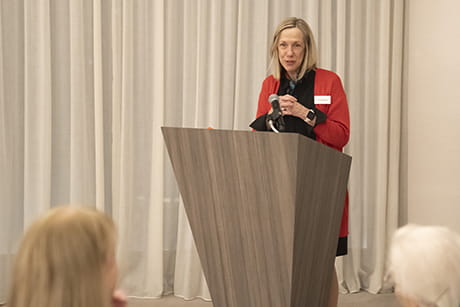 woman speaking at podium