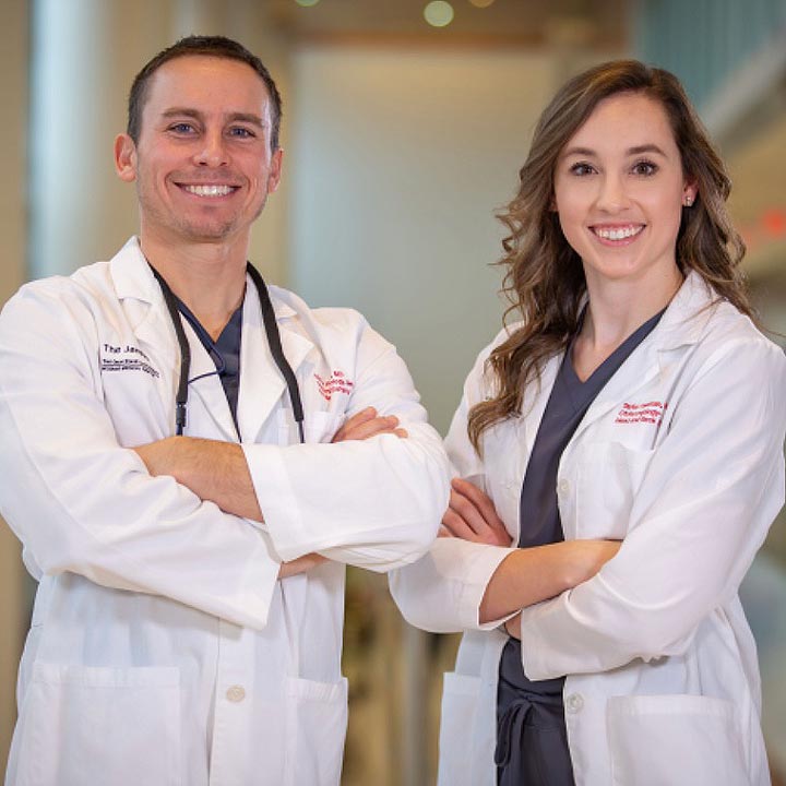 2 doctors posing-Drain-Pull-Head-and-Neck-Cancer-Patients