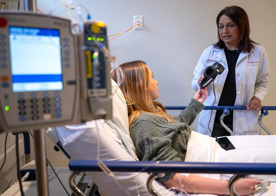 Dr. Virk with a patient