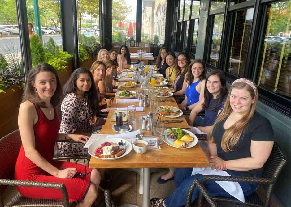 Women in radiology event inside at restaurant table