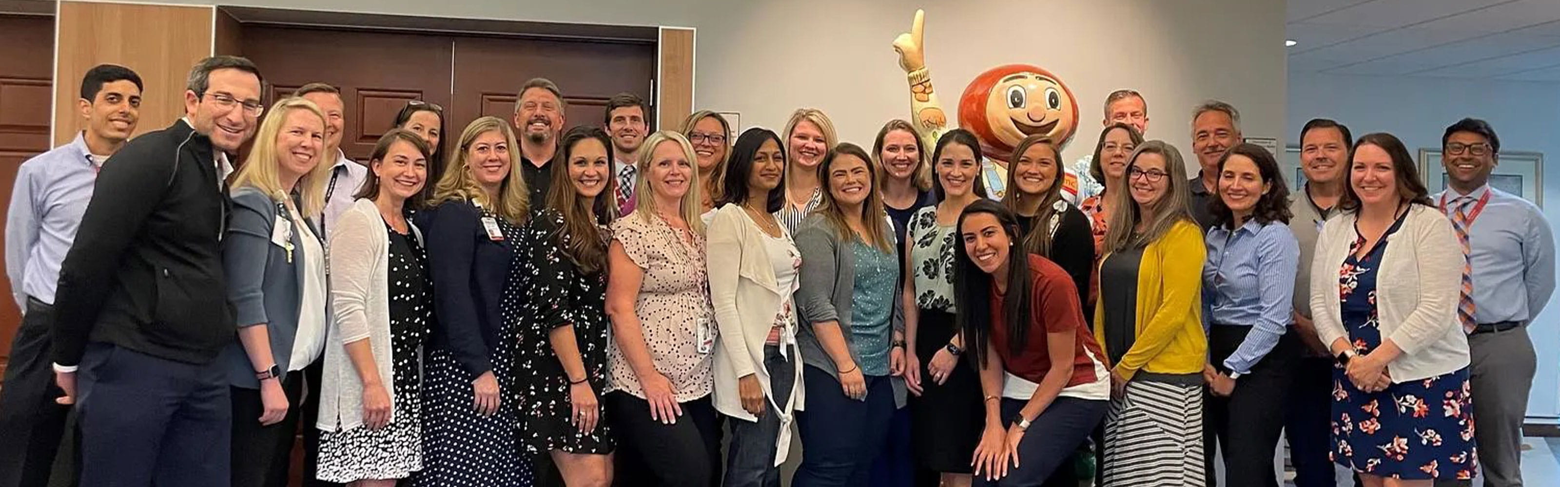 A group of people posing for a photo.