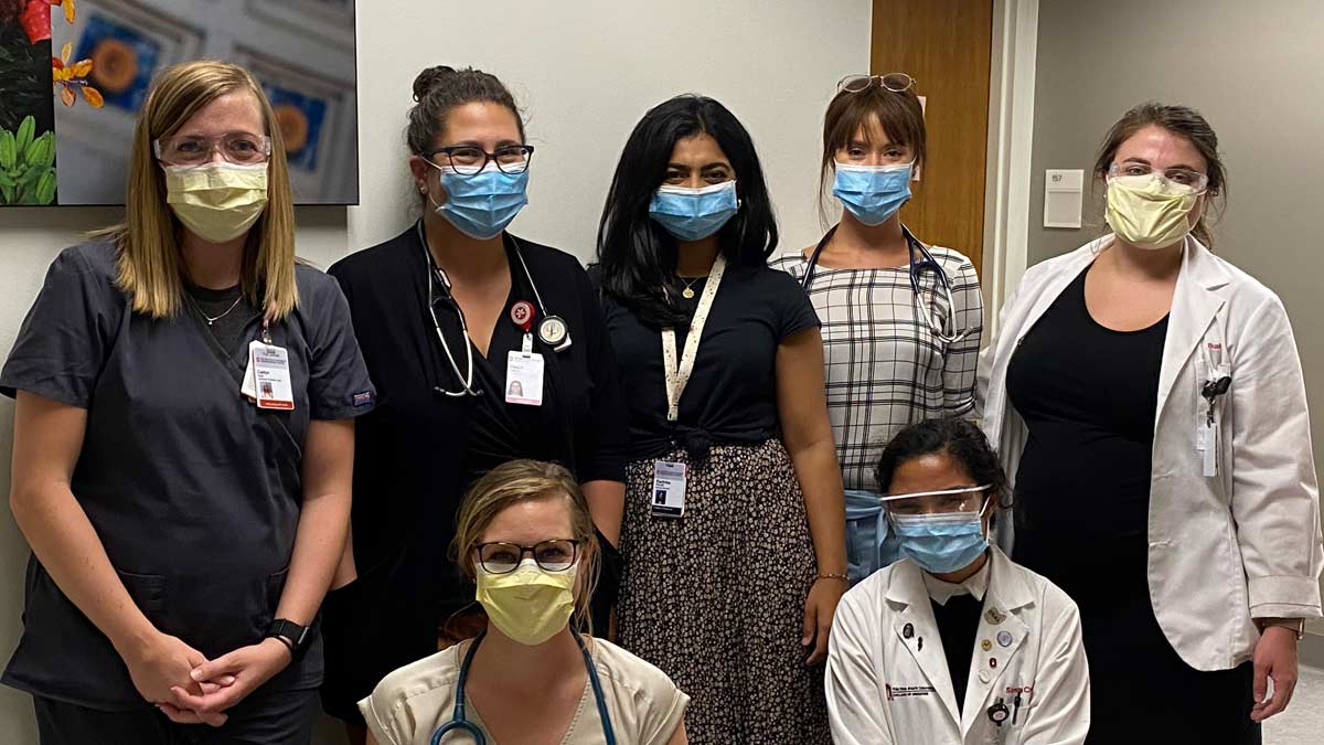 Student-run gynecology clinic staff in masks
