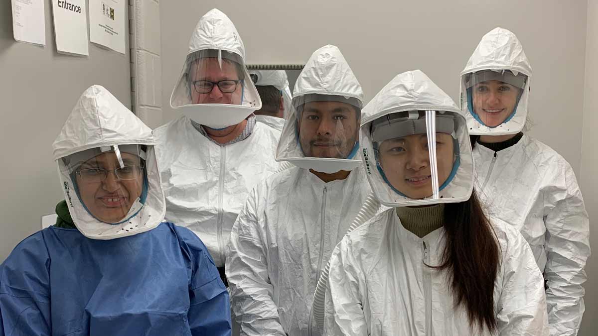Immunology team in personal protetive equipment