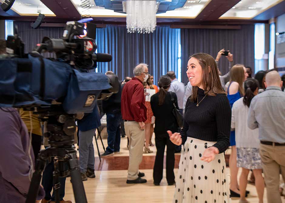 Medical student Paige S. talking to news crew on Match day