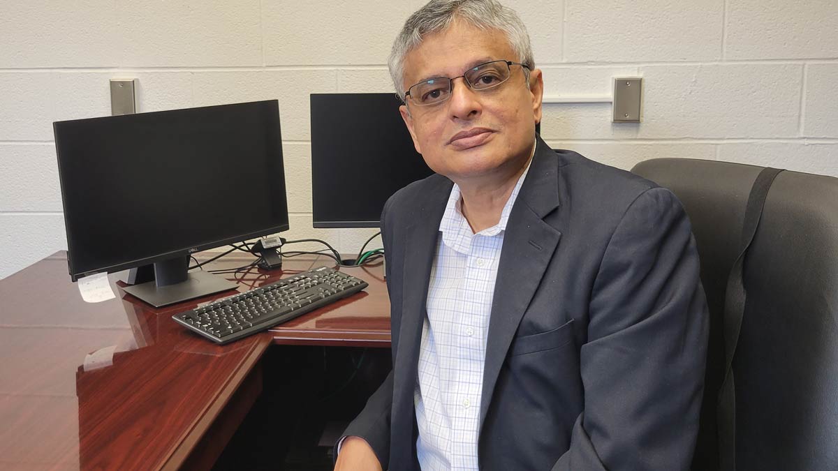 Dr. Basu at his desk