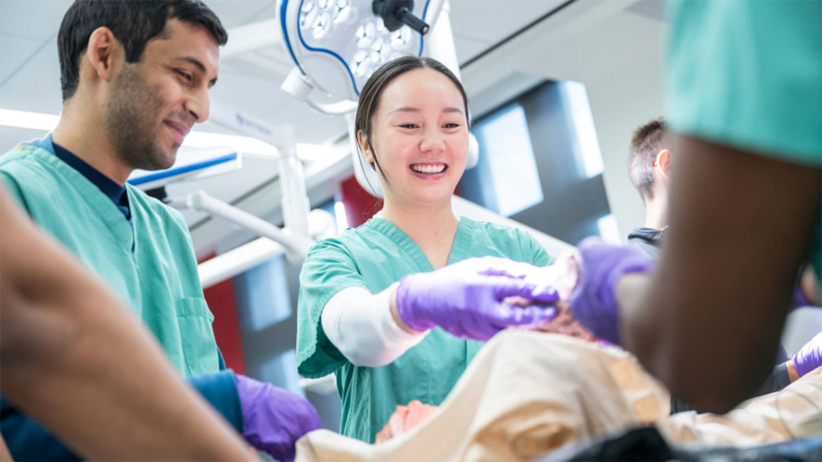 Doctors helping a patient