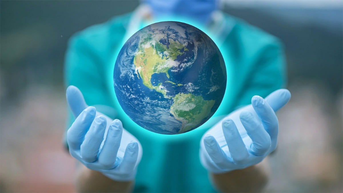 Image of a doctor holding the Earth in their hands