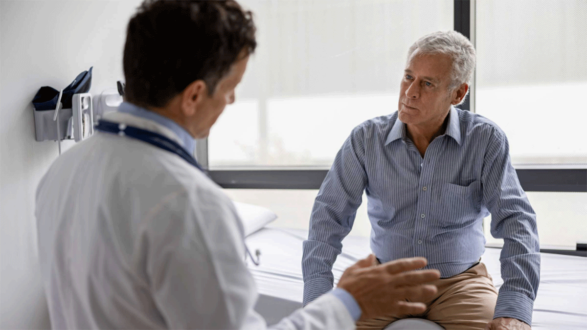 Image of a doctor meeting with a patient.