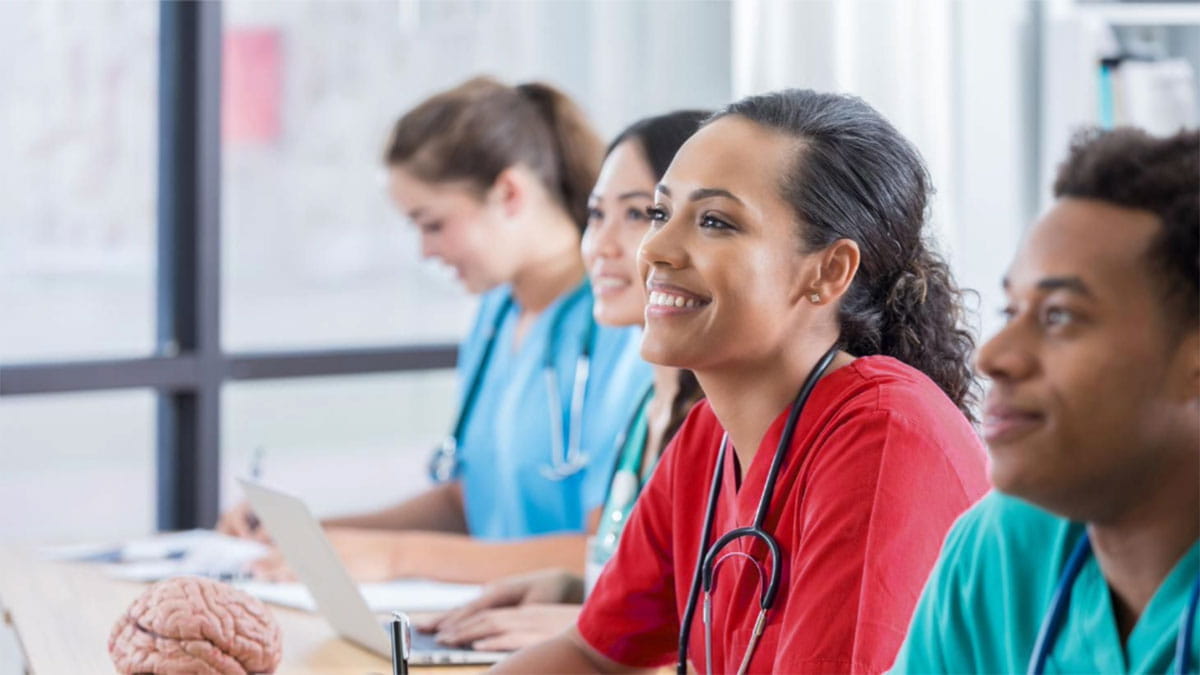 Image of a group of nurses smiling.