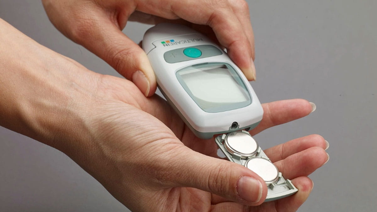 Image of hands holding a medical device.
