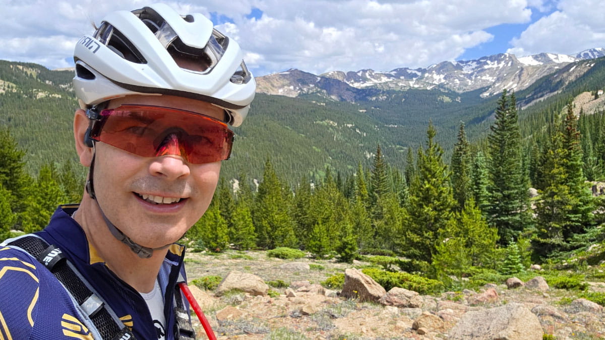 Image of a person wearing a helmet and sunglasses.