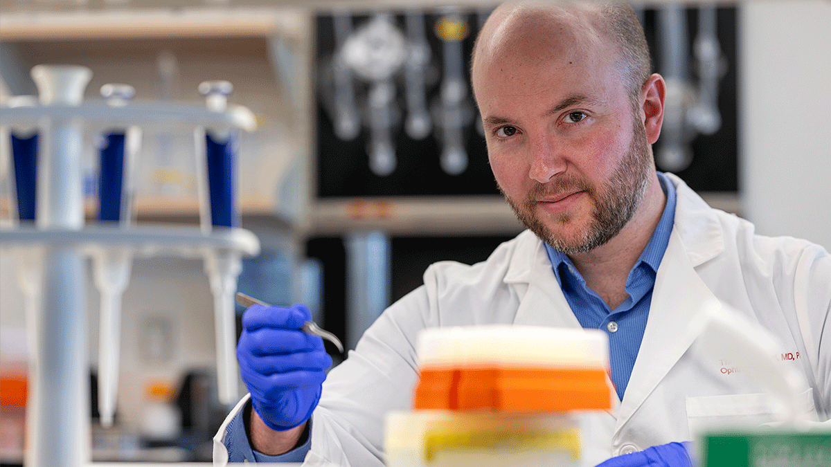 Image of Thomas Mendel working in a laboratory