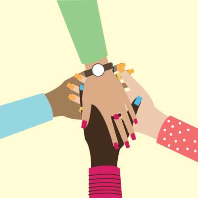 Four female hands stacked