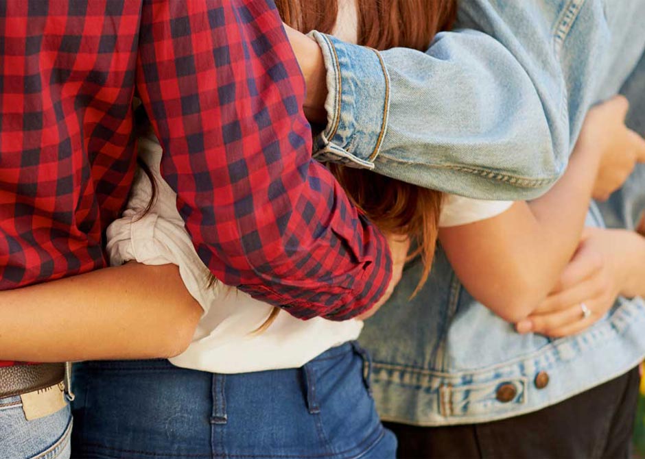 Friends embracing